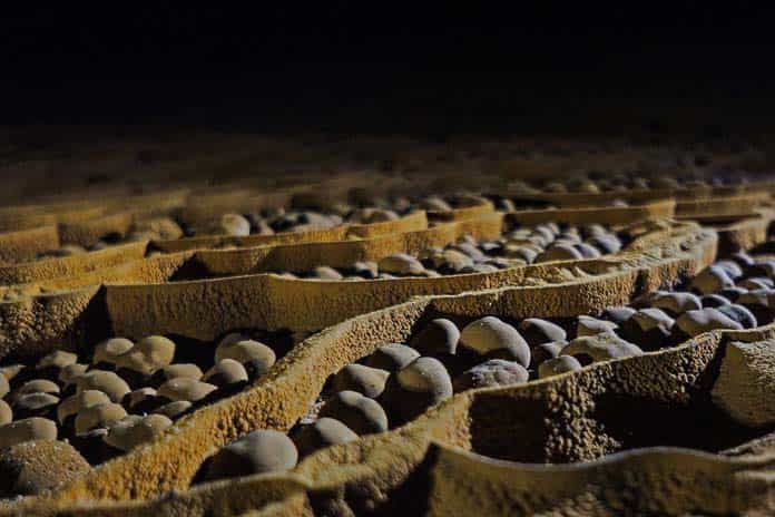 There are cave pearls with different sizes, from as small as peas to as big as baseballs.